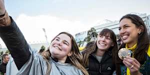 Opals team member Marianna Tolo greets fans at Melbourne Park on Saturday.