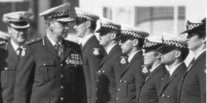 Mick Miller reviewing police graduates in August 1987,his last year as chief commissioner. 