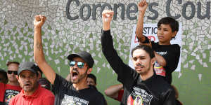 Mr Dungay's nephew Paul Silva,wearing sunglasses,stands outside the NSW Coroners Court on Friday.