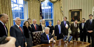 Donald Trump in the Oval Office of the White House in Washington,DC.