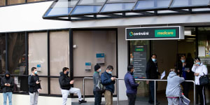 Thousands of people queued at Centrelink offices in early 2020 before the government introduced JobKeeper.