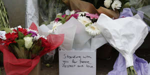Flowers left at the front gate of the New Zealand High Commission in Canberra