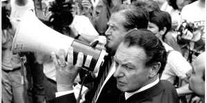 About 5,000 shop assistants marched on Parliament House. John MacBean rubbing shoulder with Fred Nile,1988.
