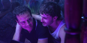 Andrew Scott (left),and Paul Mescal,as Harry,find solace in one another in All of Us Strangers.