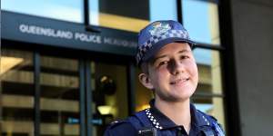 Transgender police officer Mairead Devlin,22,said he was"humbled"to raise the flag and had been overwhelmed by the support within QPS for his gender transition.