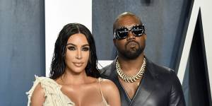 Kim Kardashian West and Kanye West arrive at the Vanity Fair Oscar Party in Beverly Hills last year.