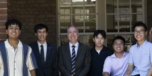 North Sydney Boys HSC students Aaryan Gandhi,Joel Gaynor,Brian Ferguson,Wilson Thai,Jordan (Khang) Ho,Joshua Chan with principal Brian Ferguson.