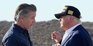 Wo are you calling stupid? Gavin Newsom greets Donald Trump at Los Angeles International Airport last year.