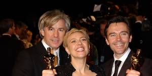 Luhrmann with wife Catherine Martin and co-writer Craig Pearce during the 2002 Vanity Fair Oscars Party. That year,Moulin Rouge! won Oscars for best art direction and best costume design.