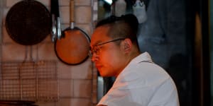 Co-founder and chef Raymond Hou works the new grill at Firepop,Enmore.