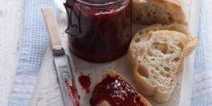 The fat in butter helps reduce the foam on top of strawberry jam.