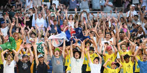 All about the fans:spectators cheer for Aussie Thanasi Kokkinakis on day three.
