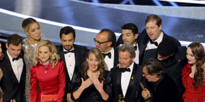 Cast and crew - Emilia Jones,Daniel Durant,Sian Heder,Marlee Matlin,Eugenio Derbez,Fabrice Gianfermi,Patrick Wachsberger,Justin Maurer,Philippe Rousselet,Troy Kotsur,and Amy Forsyth - accept the best picture award for CODA at the Oscars.