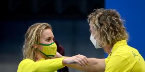 Ariarne Titmus and Dean Boxall embrace after the Australian’s memorable victory in the 400m freestyle final.