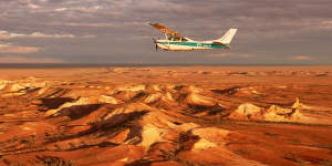 Flying over the Painted Hills,an optional side trip during the Ghan’s journey from Darwin to Adelaide.