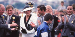 A royal affair ... Prince Charles (centre) and Princess Diana at the 1985 Melbourne Cup,flanked businessman John Elliott (second from left).