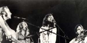 Nash perfomring with Crosby,Stills,Nash and Young in 1974 on their first reunion tour.