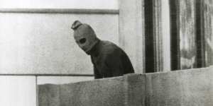 Palestinian terrorist on the balcony of Block 31 Connolly Strasse where 12 Israeli weightlifters and wrestlers were taken hostage during the 1972 Olympic Games in Munich. 