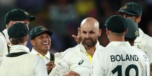 Nathan Lyon celebrates the wicket of Jermaine Blackwood against the West Indies in a day-night Test last year.