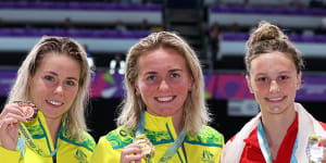 Australia’s Kiah Melverton (left) won bronze with rising Canadian star Summer McIntosh second.