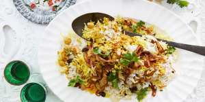 Chickpea biryani topped with crispy onions and cashews.