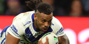 Josh Addo-Carr scores the second of his three tries.