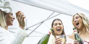 It’s tradition:Champagne days in the rain at Flemington