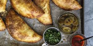 Empanadas filled with beef,chorizo and roasted tomatoes.