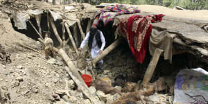 Afghan families were asleep when quake struck,now bodies pile on the streets