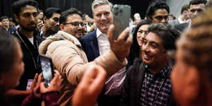 UK Opposition Leader Keir Starmer meets party faithful during the Labour conference in Liverpool.