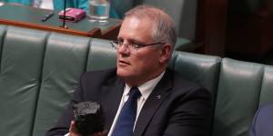 A polarising moment in politics - the then treasurer Scott Morrison with a lump of coal during question time in Parliament in February 2017. 