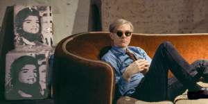 Andy Warhol on the red couch at the Factory,1964,New York.
