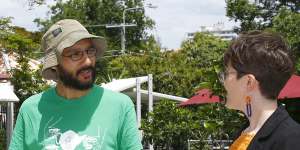 Jonathan Sri (left,pictured with South Brisbane Greens MP Amy MacMahon on state election day) says it is hard for smaller parties to attract working-class candidates.