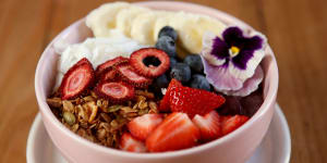 Acai bowl with banana,berries,coconut and granola.
