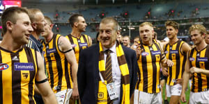 Jeff Kennett with Hawthorn players after their one point win over Essendon earlier in the season.