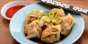 Pork and chive wontons with chilli and black bean sauce.