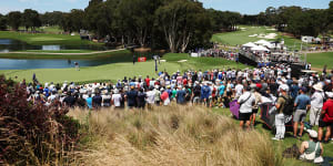 The Australian Open crowd near the ninth green at The Australian Golf Club.