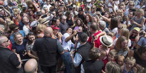 Prime Minister Justin Trudeau,centre left,takes a selfie with a person in a wheelchair during a visit to Penticton,British Columbia in 2018.