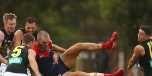 Max Gawn goes horizontal.