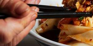 Signature Xi’an biang biang noodles,with egg,tomatoes,potatoes,carrots,pork,shallots,garlic and ginger.