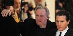 Actor Gerard Depardieu leaves to the courtroom for a break.