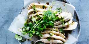 Steamed chicken with green spring onion oil.