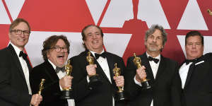 From left:Green Book producers Jim Burke,Charles B. Wessler,Nick Vallelonga,Peter Farrelly and Brian Currie pose with their Oscars after winning the award for best picture.