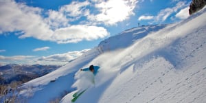 Steve Lee flies through powder at Falls Creek. 