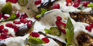 Grilled eggplant with tahini and yoghurt dressing,pomegranate,chilli and mint.