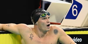 Cody Simpson catches his breath after finishing third in the men’s 100-metre butterfly final during day one of the 2022 Australian Swimming Championships