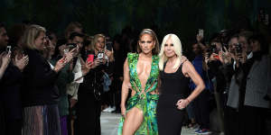 Jennifer Lopez and Donatella Versace walk the runway at the Versace show during the Milan Fashion Week Spring/Summer 2020.