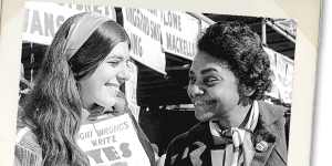 Activist Faith Bandler (right) hands a leaflet to a voter in the 1967 referendum.