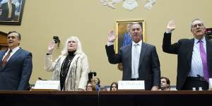 From left:Witnesses Jonathan Turley,Eileen O’Connor,Bruce Dubinsky and Michael Gerhardt swear in before the first hearing.