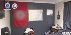 A Nazi flag was discovered in the Orange property raided on Friday. 
